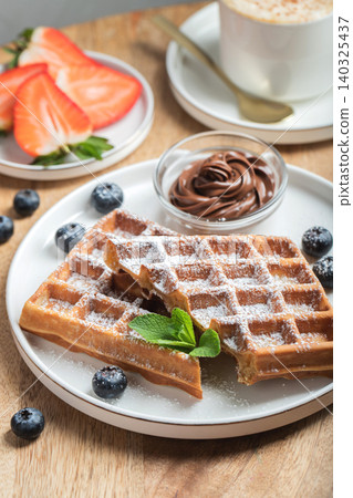 Belgium waffles Homemade waffles with strawberries Belgium waffles Homemade waffles with strawberries 140325437