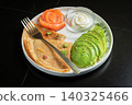 Roasted thin pancakes with smoked salmon and sauce 140325466
