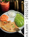 Roasted thin pancakes with smoked salmon and sauce 140325467