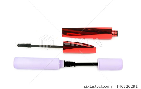 Open mascara tubes in metallic red and pastel purple with brushes isolated on a white background 140326291