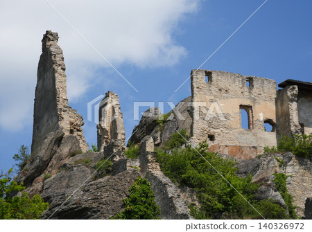 Durnstein Castle ruins in Krems, Austria on green hill representing historic architecture and cultural heritage Durnstein Castle ruins in Krems, Austria on green hill representing historic architecture and cultural heritage 140326972