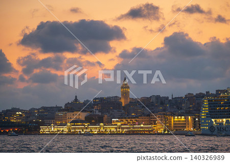 Istanbul at Dusk: Galata Tower Illuminated by Sunset Glow Istanbul at Dusk: Galata Tower Illuminated by Sunset Glow 140326989