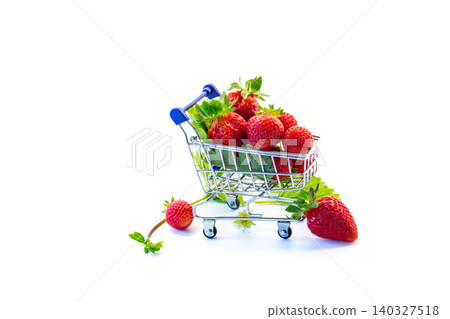 Fresh strawberries in miniature shopping cart isolated Fresh strawberries in miniature shopping cart isolated 140327518