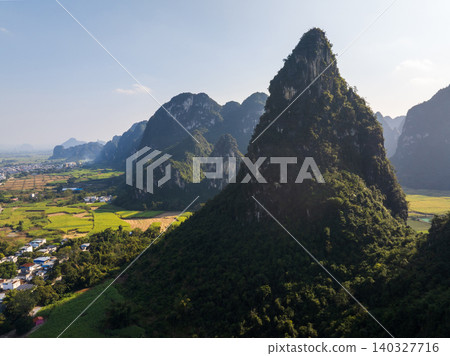 Stunning Karst Mountain Landscape in Guangxi, China Under Clear Blue Sky 140327716