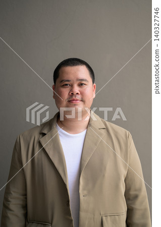 Confident plus size Isan Thai businessman corporate portrait vertical Confident plus size Isan Thai businessman corporate portrait vertical 140327746