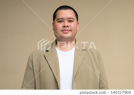 Confident plus size Isan Thai businessman portrait horizontal Confident plus size Isan Thai businessman portrait horizontal 140327909