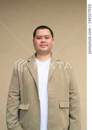 Confident plus size Isan Thai businessman portrait vertical Confident plus size Isan Thai businessman portrait vertical 140327910