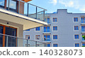View of modern residential building with glass balconies and bright facade. Contemporary apartment building in european city. Concept of urban living and modern architecture.  140328073