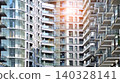 View of modern residential building with glass balconies and bright facade. Contemporary apartment building in european city. Concept of urban living and modern architecture.  140328141