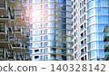 View of modern residential building with glass balconies and bright facade. Contemporary apartment building in european city. Concept of urban living and modern architecture.  140328142