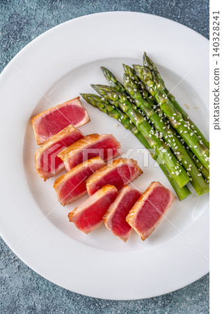 Perfectly Seared Yellowfin Tuna Steak With Asparagus And Sesame Seeds Perfectly Seared Yellowfin Tuna Steak With Asparagus And Sesame Seeds 140328241