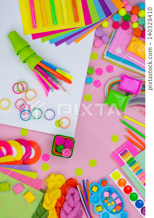 Colorful art crafts for drawing around. View from above. Creative art supplies. Decorative elements for hobbies 140328410