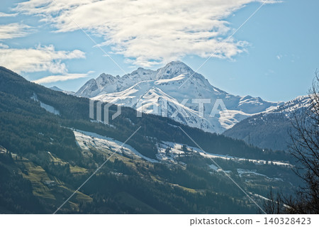 Mountain peak in snow against blue sky, Ziller Valle in, Austria Mountain peak in snow against blue sky, Ziller Valle in, Austria 140328423