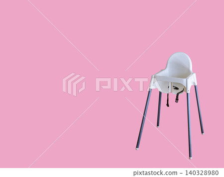 A minimalistic white baby high chair with metal legs stands alone against a solid pink background A minimalistic white baby high chair with metal legs stands alone against a solid pink background 140328980