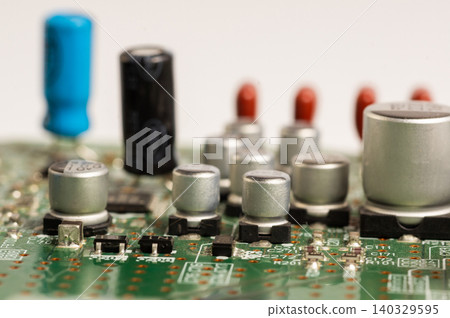 Close-up view of a circuit board with electronic components and connectors. Close-up view of a circuit board with electronic components and connectors. 140329595