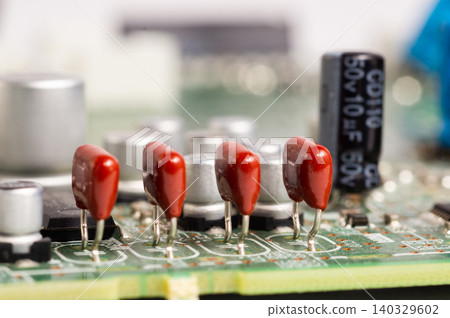 Close-up view of a circuit board with electronic components and connectors. Close-up view of a circuit board with electronic components and connectors. 140329602