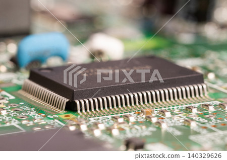 Close-up view of a circuit board with electronic components and connectors. Close-up view of a circuit board with electronic components and connectors. 140329626