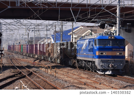 JR East EF510-504 locomotive pulling a freight train during its off-peak hours as a sleeper express train (photographed on February 4, 2011). JR East EF510-504 locomotive pulling a freight train during its off-peak hours as a sleeper express train (photographed on February 4, 2011). 140330382