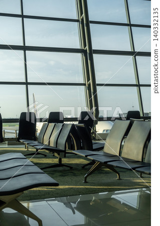 Empty seating in departure area of the Soekarno Hatta International Airport CGK, in Jakarta, Indonesia 140332135