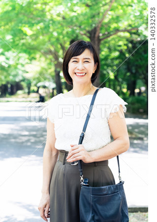 middle-aged women commuting to work 140332578