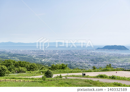 A view of Hakodate city from the Dai Ranch Observation Deck in Nanae-cho, Kameda-gun, Hokkaido. A view of Hakodate city from the Dai Ranch Observation Deck in Nanae-cho, Kameda-gun, Hokkaido. 140332589