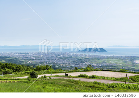 A view of Hakodate city from the Dai Ranch Observation Deck in Nanae-cho, Kameda-gun, Hokkaido. A view of Hakodate city from the Dai Ranch Observation Deck in Nanae-cho, Kameda-gun, Hokkaido. 140332590