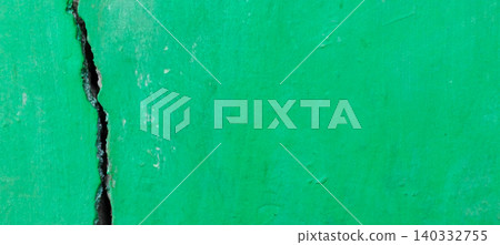 Cracked green concrete wall texture with structural damage details Cracked green concrete wall texture with structural damage details 140332755