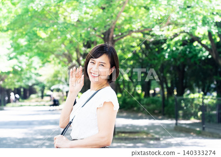 middle-aged women commuting to work middle-aged women commuting to work 140333274