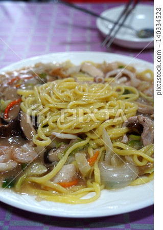 Korean unique stir fried noodles with thick savory sauce and shrimps Korean unique stir fried noodles with thick savory sauce and shrimps 140334528