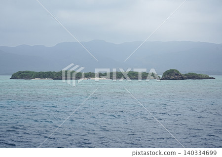 Hatojima Island as seen from Uehara Port on Iriomote Island, Okinawa Prefecture 140334699