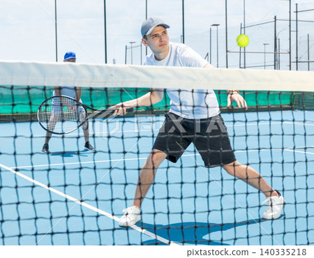 Sportsman ready to hit volley. Sportsman ready to hit volley. 140335218