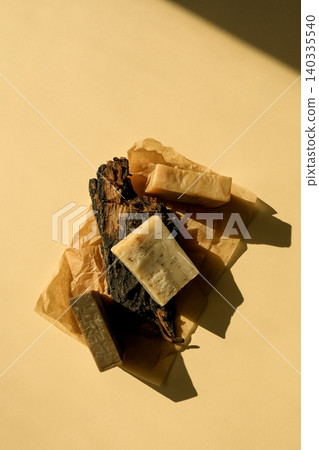 Natural soaps placed on brown paper showing light and shadow Natural soaps placed on brown paper showing light and shadow 140335540