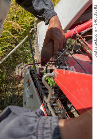 combine, combine harvester, rice harvesting 140335592