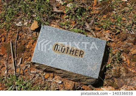 Brick Stone in Cemetery With Word Mother Engraved Brick Stone in Cemetery With Word Mother Engraved 140336039
