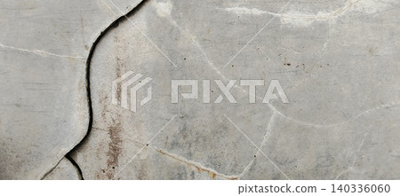 Abstract cracked concrete wall texture with weathered surface Abstract cracked concrete wall texture with weathered surface 140336060