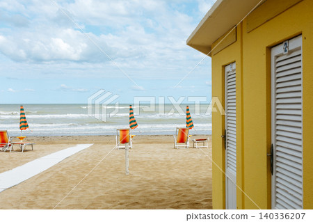 Yellow Beach Cabin with Umbrellas and Sea View Yellow Beach Cabin with Umbrellas and Sea View 140336207