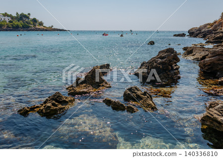 Rocky Mediterranean Coastline with Crystal Clear Sea Water on Sunny Day 140336810