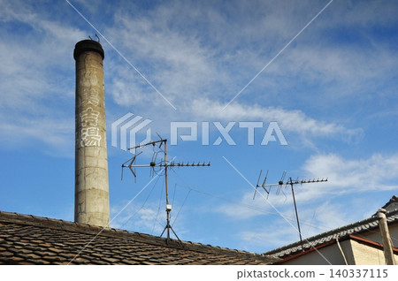A scene with a public bathhouse chimney A scene with a public bathhouse chimney 140337115