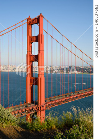 Golden Gate Bridge tower close view above San Francisco Bay 140337663
