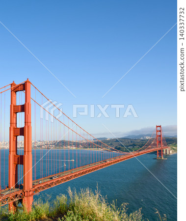 Golden Gate Bridge vertical panorama with blue sky and bay Golden Gate Bridge vertical panorama with blue sky and bay 140337732