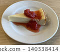 Strawberry sauce New York cheesecake 140338414