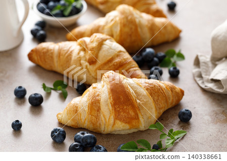 Croissant with blueberries for breakfast Croissant with blueberries for breakfast 140338661