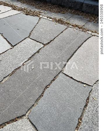 A path of uneven tiles that makes you want to walk. 140338908