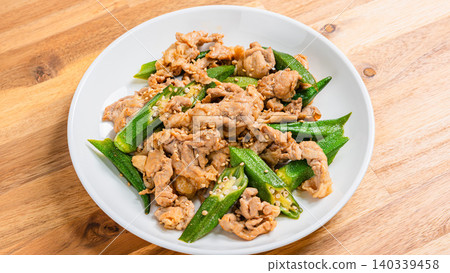 Stir-fried okra and pork, a Japanese-style dish with sesame flavor. Stir-fried okra and pork, a Japanese-style dish with sesame flavor. 140339458