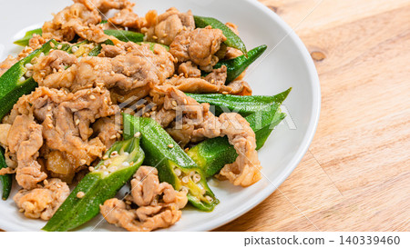 Stir-fried okra and pork, a Japanese-style dish with sesame flavor. Stir-fried okra and pork, a Japanese-style dish with sesame flavor. 140339460