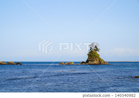 A view of Toyama Bay and the hazy Tateyama mountain range from Amaharashi Coast. A view of Toyama Bay and the hazy Tateyama mountain range from Amaharashi Coast. 140340982