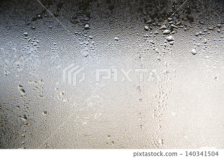 Condensation and water droplet texture on window glass Condensation and water droplet texture on window glass 140341504