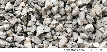 Pile of gray pebbles of various sizes and natural shapes Pile of gray pebbles of various sizes and natural shapes 140341769