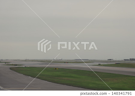 April 24 2026 Airport Runway And Taxiways Under Overcast Sky April 24 2026 Airport Runway And Taxiways Under Overcast Sky 140341791