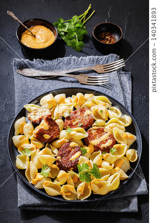 Shell Pasta And Meat Patties on a Plate Shell Pasta And Meat Patties on a Plate 140341893